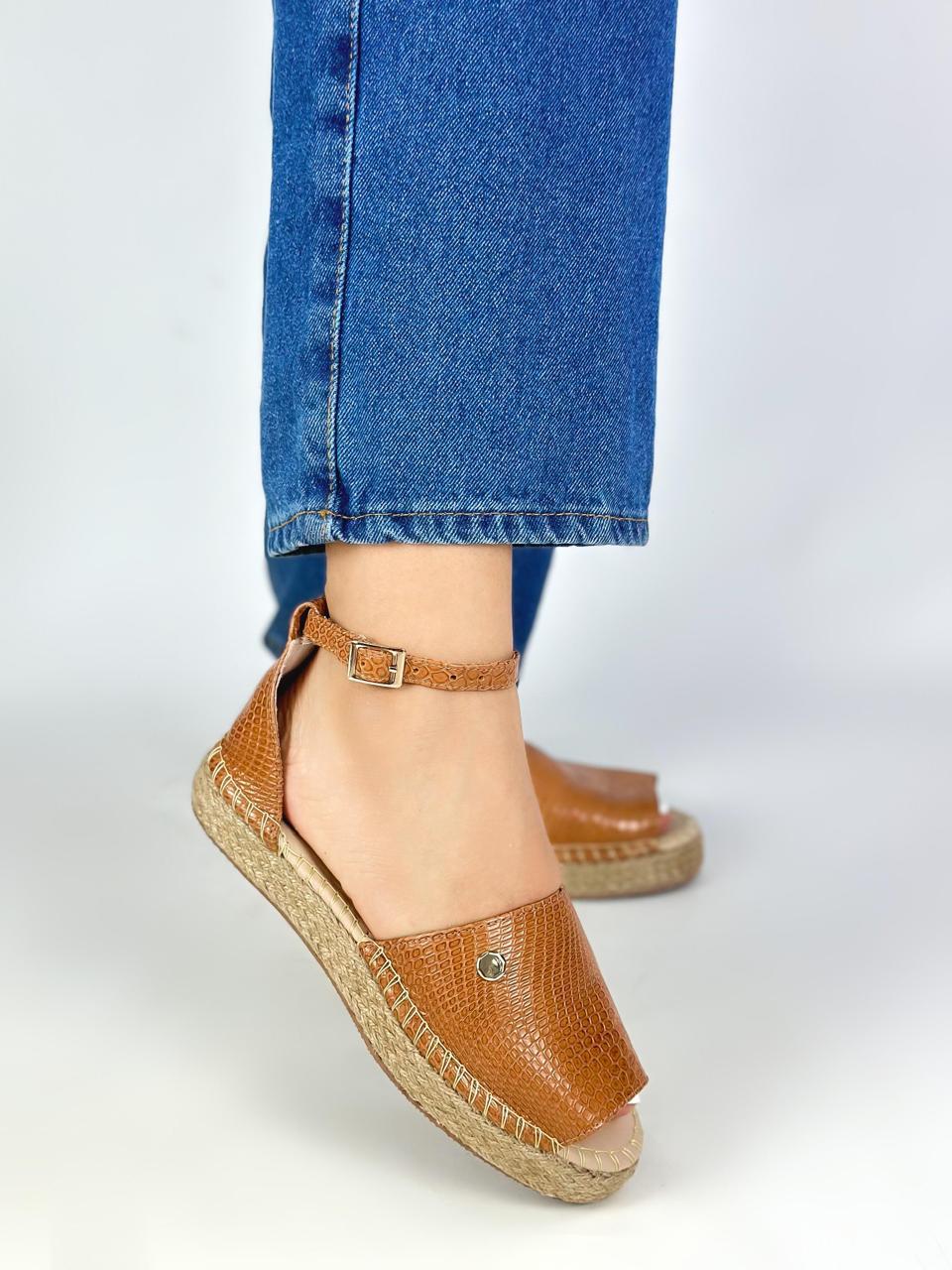 CANOA TALON CUERO